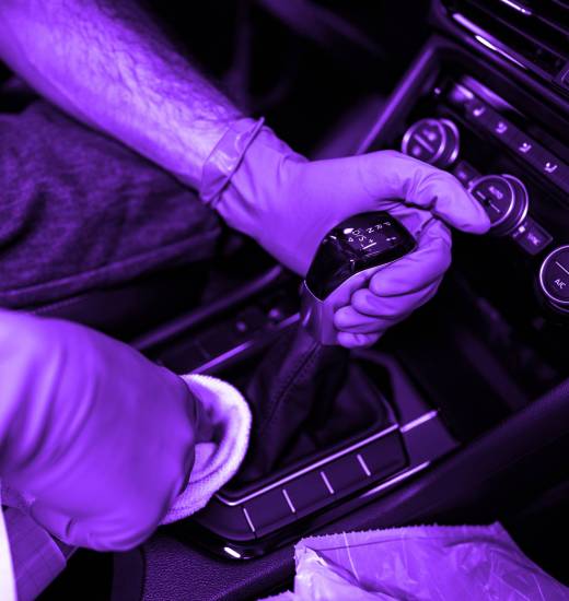 A man cleaning car interior, car detailing in Carwash service, close up